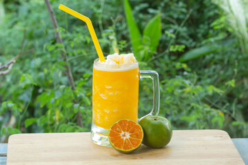 glass of fresh orange juice smoothie