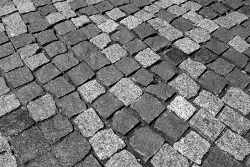 Stone pavement texture in black and white.