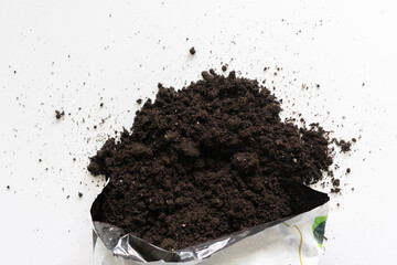 top view of the soil dirt package to plante home flowers on the table