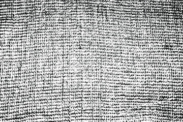 Grunge texture of uneven rough fabric. Monochrome background of a waffle towel with spots, noise and grain. Overlay template. Vector illustration