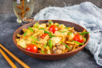 Stir fry farfalle pasta with vegetables, cauliflower and mushrooms