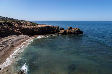 Fototapeta na wymiar South coast of the Atlantic ocean of Morocco, Agadir. rocky shore
