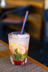 Refreshing mojito with crushed ice on a hot summer day