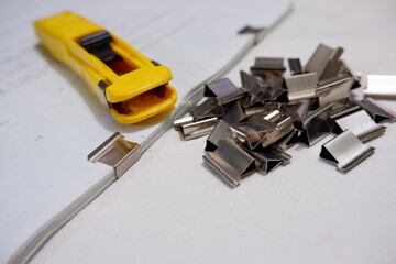 binding clips with a clipper