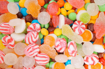 Fototapeta na wymiar Fruit candies and jellies background