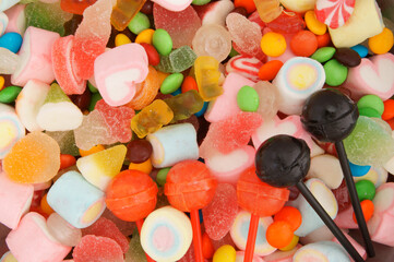 Colorful fruit candies and jellies as background