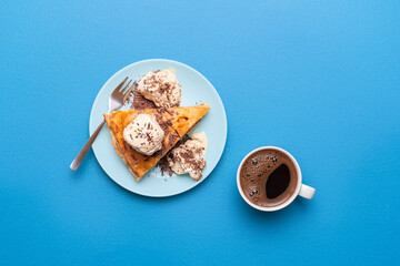 Apple pie with ice cream and cup of coffee. Top view of apple tart slice