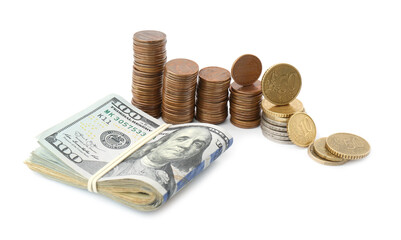 Dollar bills and coins isolated on white