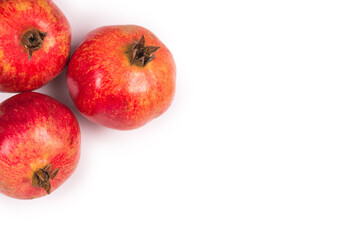 Sweet pomegranate isolated on white background.