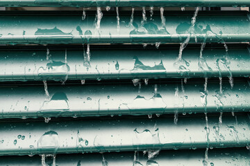 Close-up of rain drops on the shutter, detail