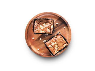 Brownie on wooden plate isolated