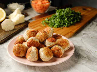 Cutlet meatball with farm minced meat cooking homemade with vegetables, herbs, spices and other ingredients by family recipe  on home kitchen background with ingredients