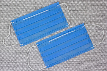 Two blue face masks.