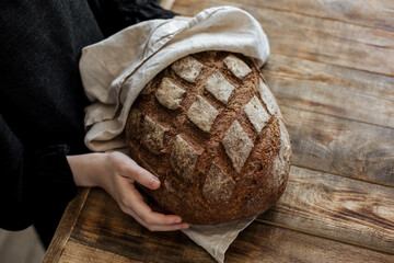 On a wooden table rye bread
