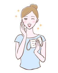 綺麗に化粧をしてマスクを持っている女性