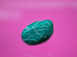 Obraz na płótnie Canvas Amazonite, also known as Amazonstone, is a green tectosilicate mineral, a variety of the potassium feldspar.