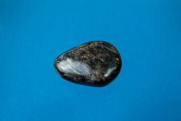 Astrophyllite is a very rare, brown to golden-yellow hydrous potassium iron titanium silicate mineral.