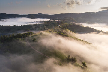 Aerial foggy landscape in Transylvania, at sunrise