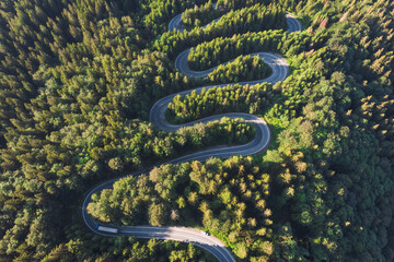 Aerial landscape of mountain winding road, in Transylvania