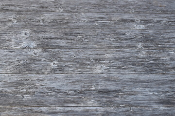 Gray weathered wooden boards wall or table vintage design background.
