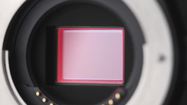 Open mirrorless digital Camera shows shutter mechanism close up view