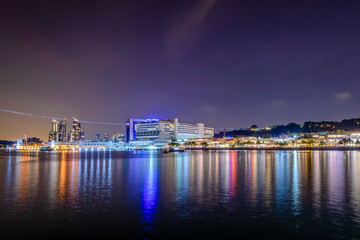 Fototapeta na wymiar Singapore 2016 Sentosa Boardwalk overlook to HarbourFront Centre by night