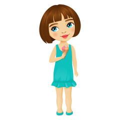 Cute little girl with big blue eyes stands and eating ice cream