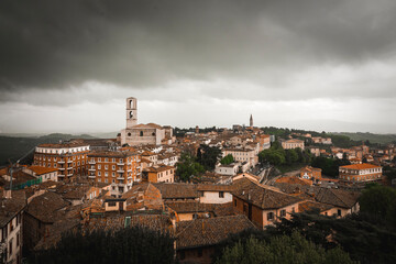 Fototapeta premium aerial view of the city of Perugia with the bell tower of the Basilica of San Domenico that stands out on all buildings
