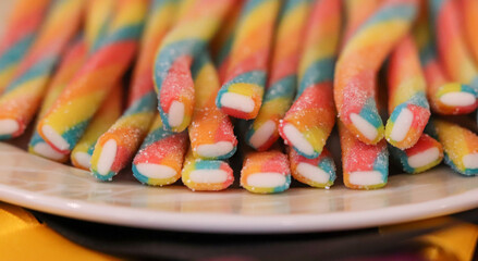 Different types of candy that give a beautiful color to the image.