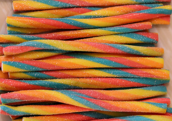 Different types of candy that give a beautiful color to the image.