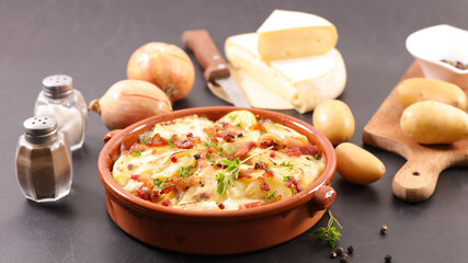 french tartiflette- traditional baked cheese, bacon and potato