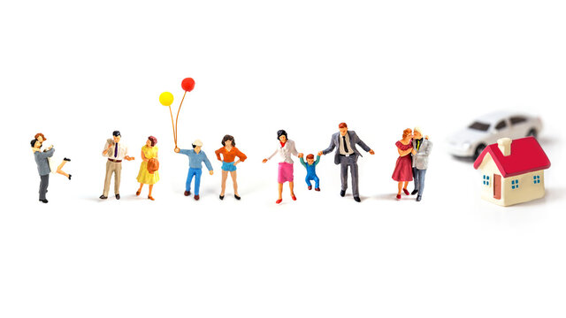 miniature people on white background.