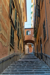 Fototapeta na wymiar Genoa medieval old street caruggi salita dinegro