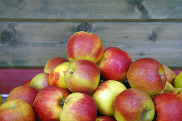 red apples on a wooden table