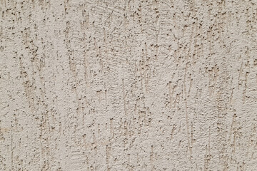 layer of decorative plaster on the wall of the building