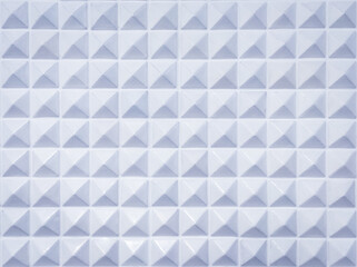 Sharp pyramidal elements geometric textured. Plastic sharp pyramidal background.