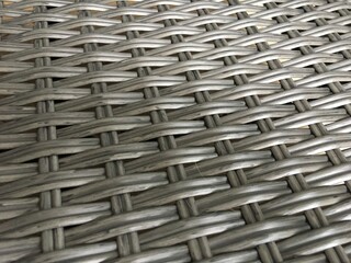 Gray wicker texture closeup. Background for website design, screen, banner. High quality photo