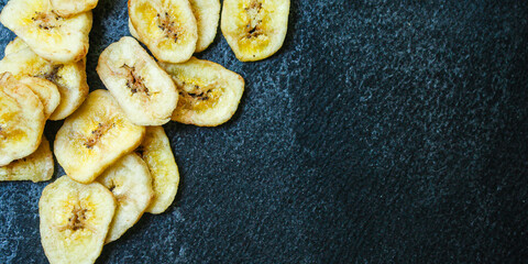 banana chips
sweet dried food snack delicacy
Menu concept serving size. food background top view copy space for text
organic healthy eating
raw
