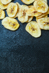 banana chips
sweet dried food snack delicacy
Menu concept serving size. food background top view copy space for text
organic healthy eating
raw
