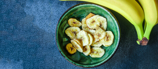 banana chips
sweet dried food snack delicacy
Menu concept serving size. food background top view copy space for text
organic healthy eating
raw