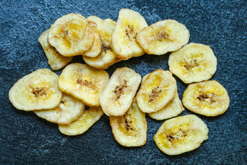banana chips
sweet dried food snack delicacy
Menu concept serving size. food background top view copy space for text
organic healthy eating
raw