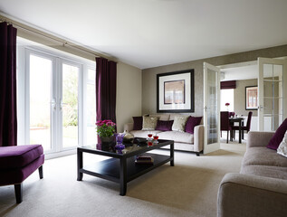 Fototapeta premium Beautiful interior of a living room with colorful furniture