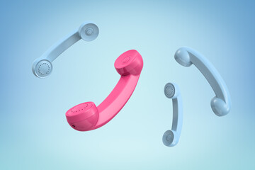 3d rendering of three blue and a pink retro telephone receivers on blue background