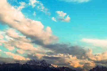 Sky and mountains. Sunset with dramatic color of sky and clouds