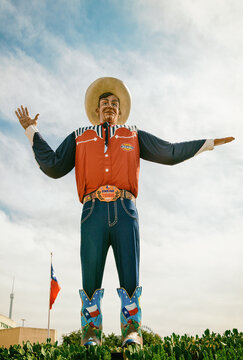 Big Tex statue standing tall at Fair Park. The icon greets and waves his hands to welcome visitors at the Texas State Fair fairgrounds on October 17, 2019 in Dallas, Texas.