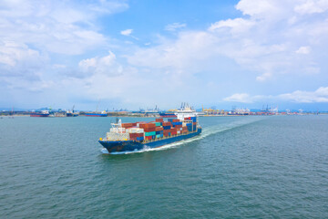 Container , container ship in export and import business and logistics. Shipping cargo to harbor by...