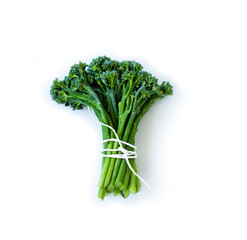 Fresh broccolini isolated on white background with copy space.