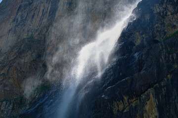 water falling at high speed in a ray of light