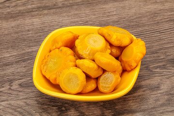 Marinated yellow patisson in the bowl