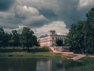 Beautiful summer landscape of the Park with a pond and a Great Gatchina Palace. Russia